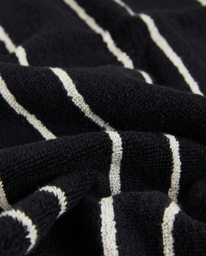 TOWEL WITH IRREGULAR STRIPE DETAIL